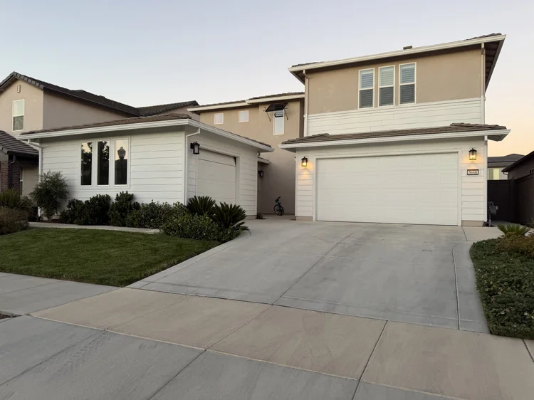 The front of the home at dusk.