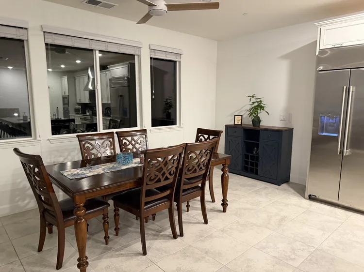 The dining table set for six.