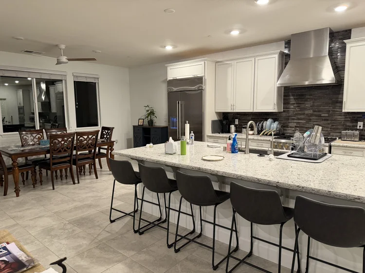 The kitchen island with seating for five.