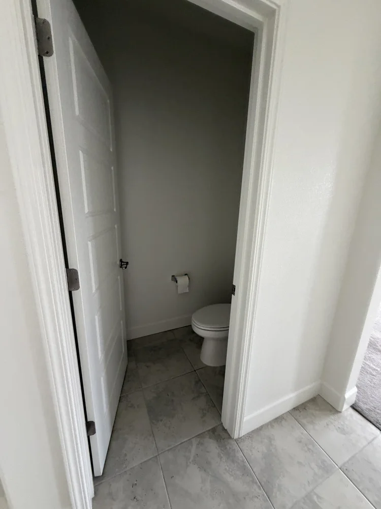 The downstairs powder room.