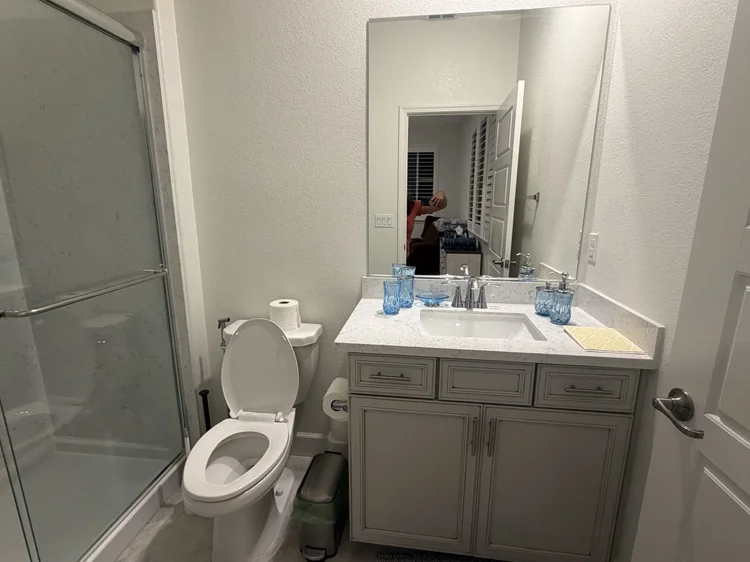 A full bathroom with a shower and tub.