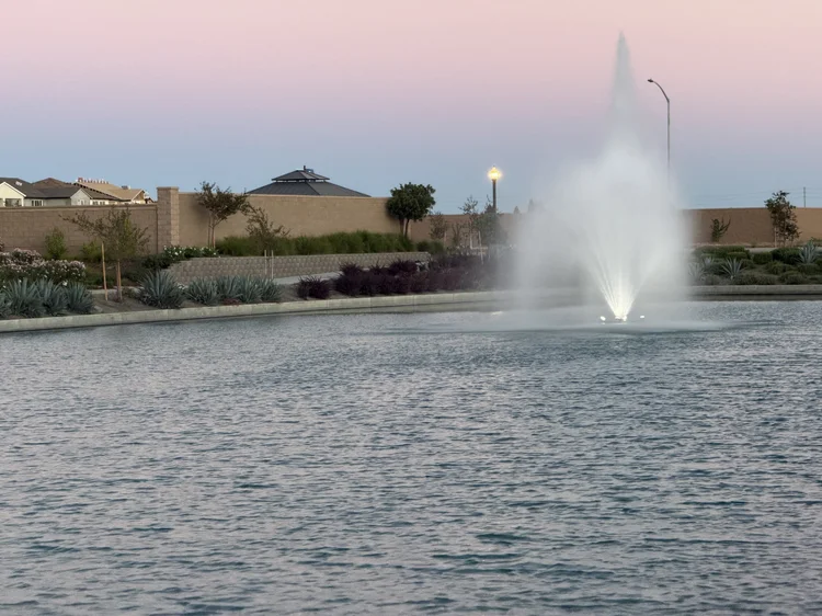 The fountain on the neighborhood lake.
